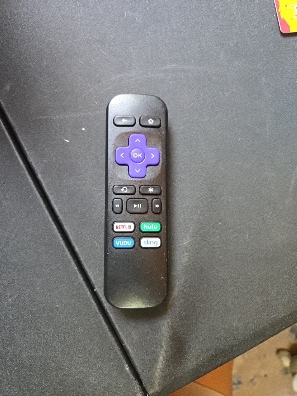 Roku Black Remote with Purple Directional Pad and App Shortcuts